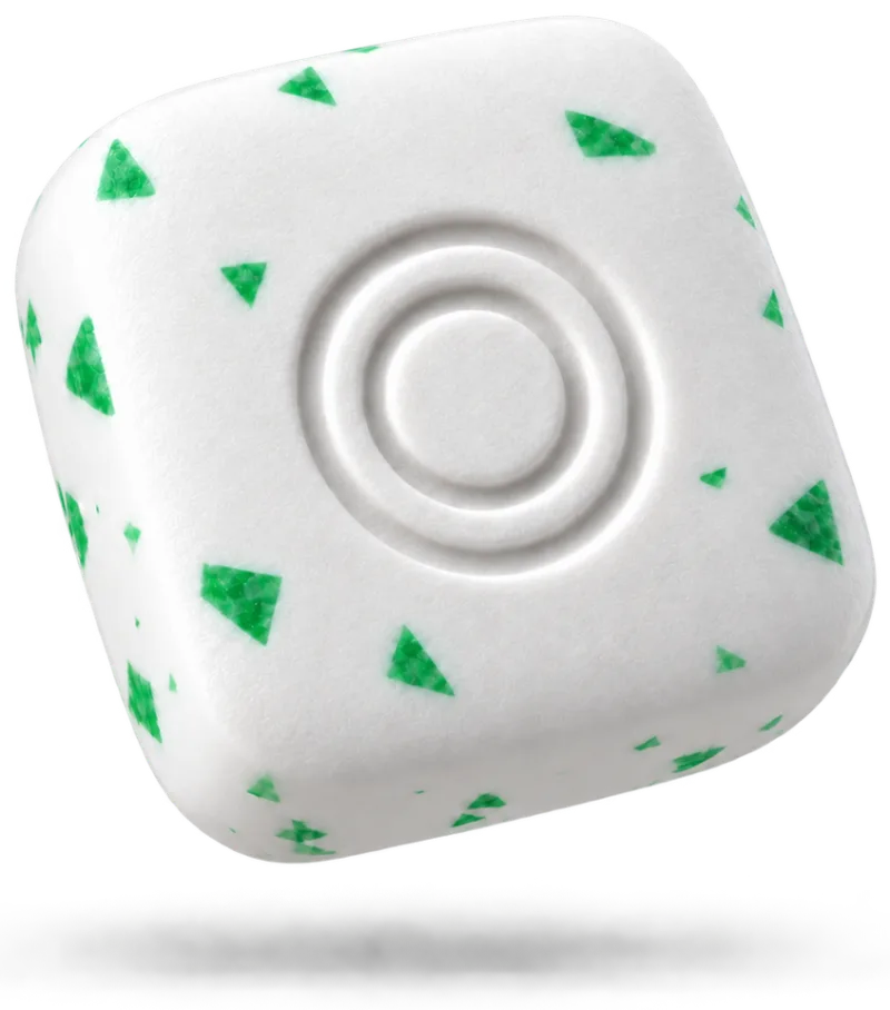 White ONEORAL Energy Gum piece with green mint flecks and an embossed two-ring symbol